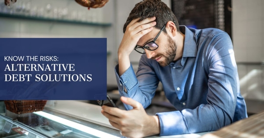 Distressed man holding phone