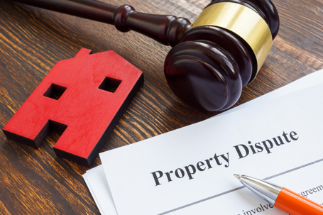 a gavel and property dispute documents